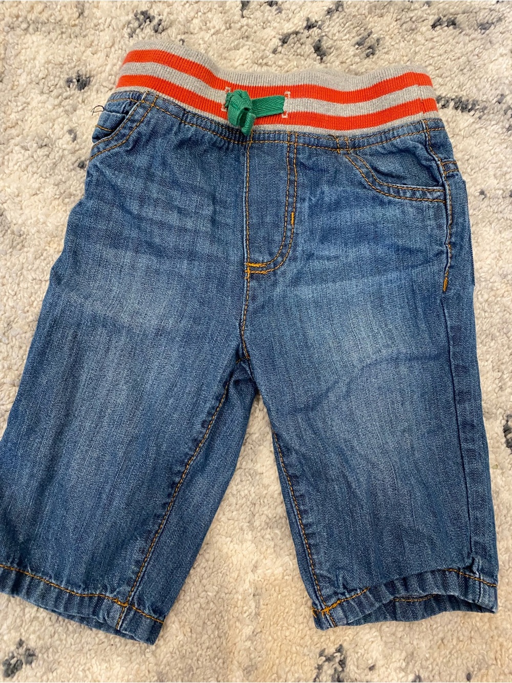 Baby Boden Denim Shorts with Orange-Striped Waistband and Green Drawcord